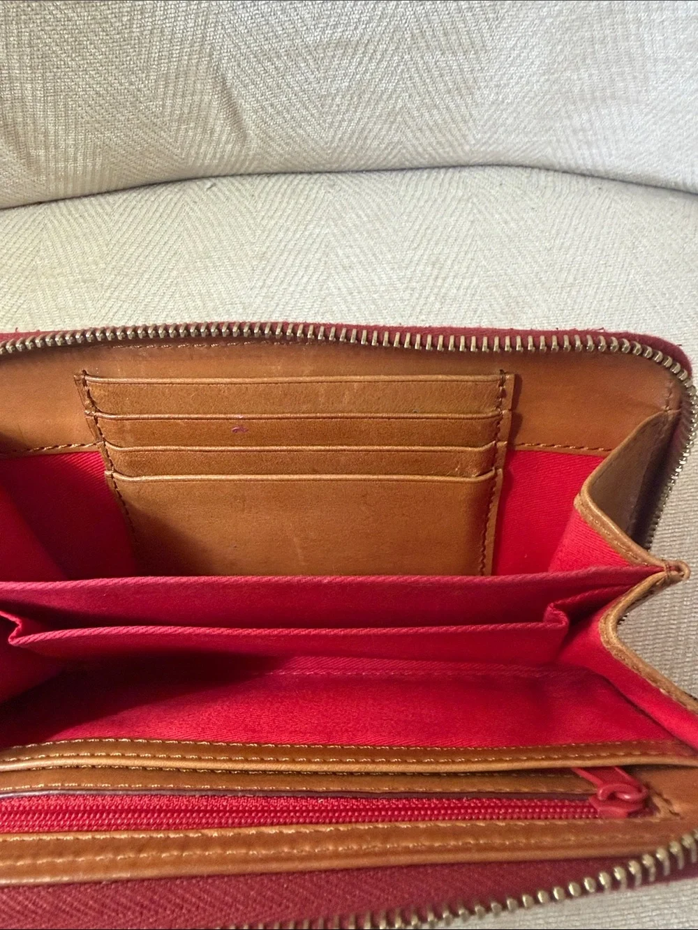 Dooney & Bourke Red Pebbled Leather Zip Wallet with Gold Plaque